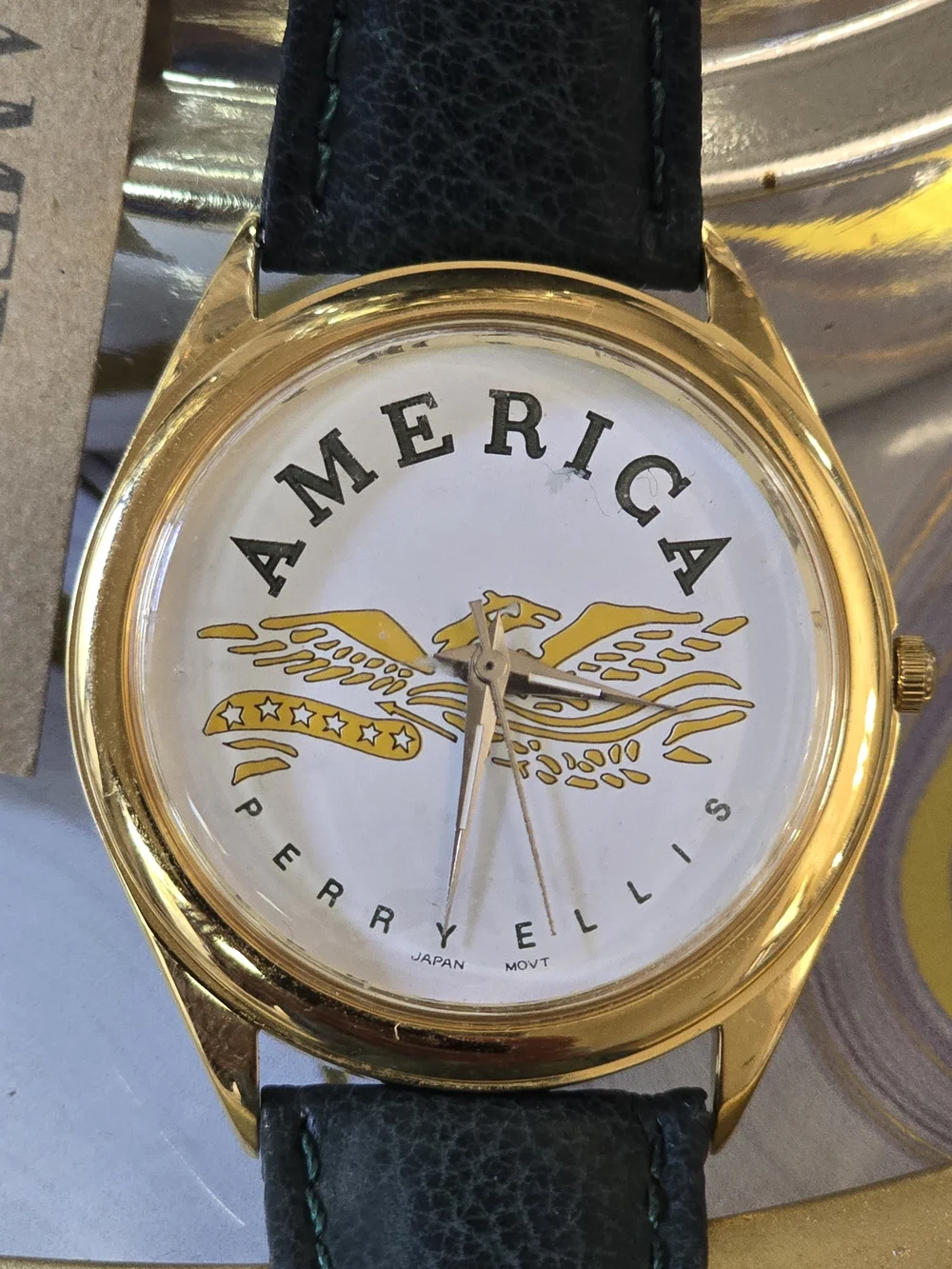 Perry Ellis Gold-Tone Watch with Black Leather Strap